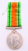 A WWII 1939-45 Defence medal. 3.75 cm diameter.