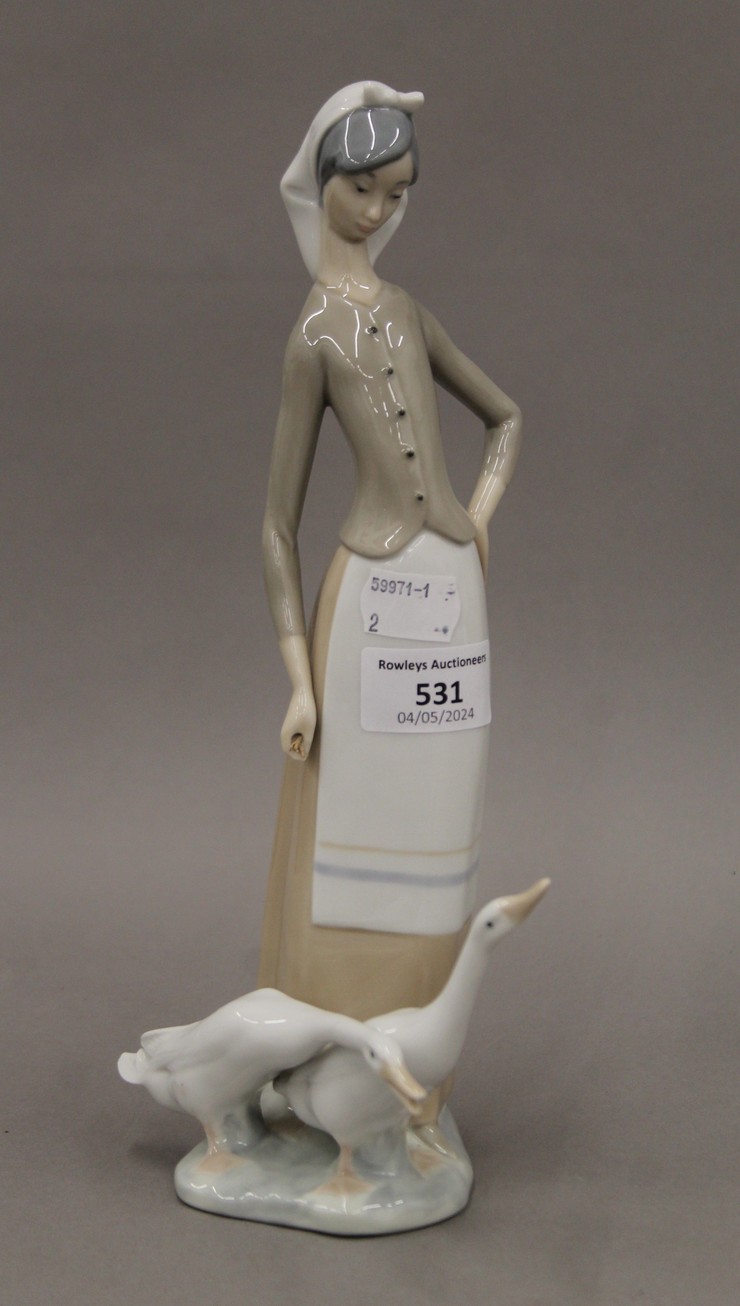 Four Lladro figurines and two Nao figurines. The largest 27.5 cm high. - Image 7 of 17