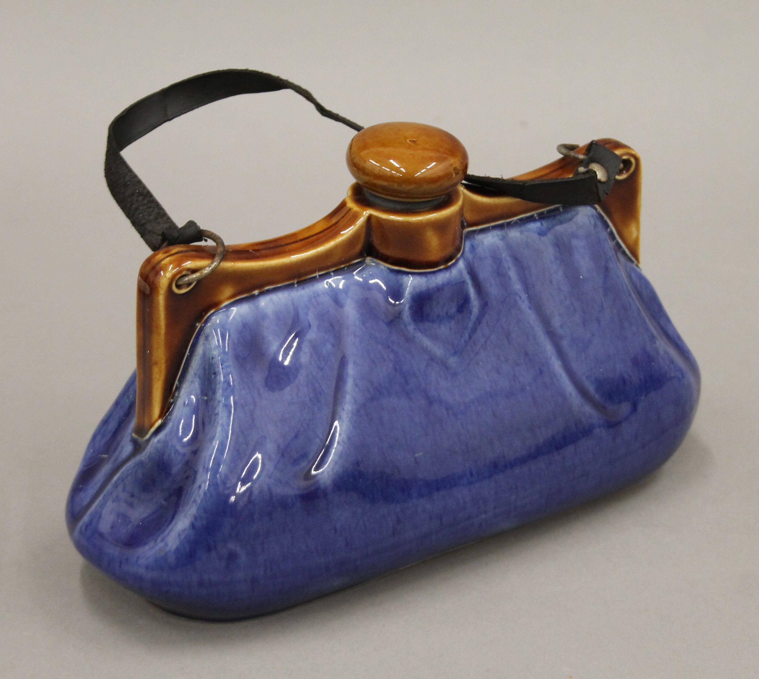 A Bourne Denby stoneware hot water bottle in the form of a ladies handbag. 25 cm long. - Image 3 of 4