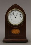 An Edwardian inlaid mahogany mantle clock. 22 cm high.