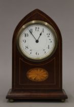 An Edwardian inlaid mahogany mantle clock. 22 cm high.