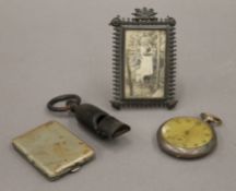 A small quantity of miscellaneous items including an NER horn whistle, a miniature photograph frame,