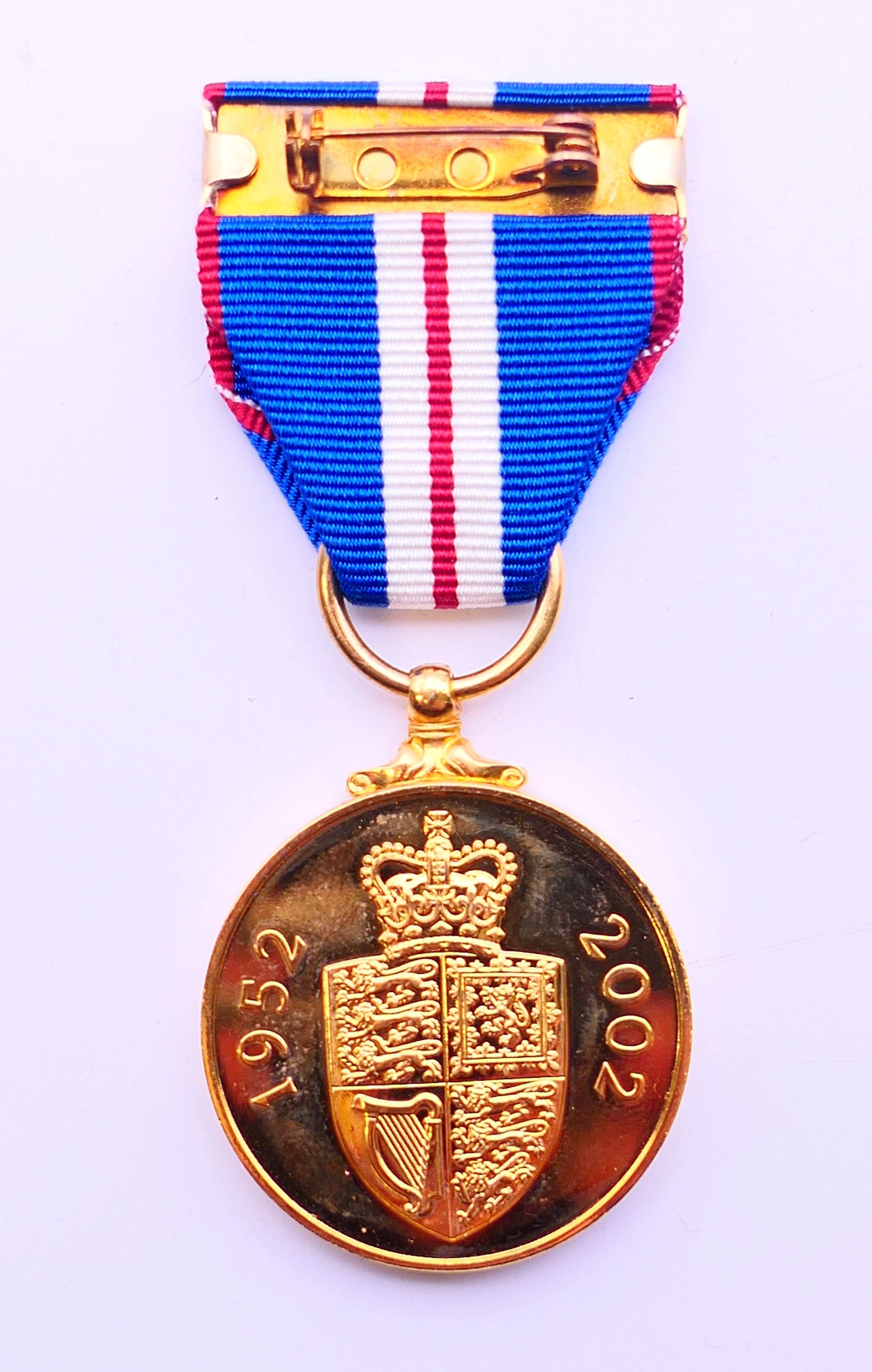 The Queen Jubilee Medal (1952-2002), boxed, with spare ribbon. - Image 4 of 6