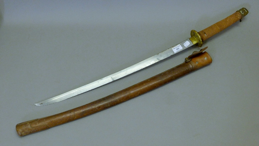 A vintage Japanese katana in scabbard. 103 cm long. - Image 9 of 21