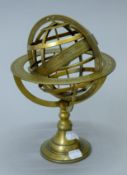 An astrological globe on a stand. 26 cm high.