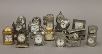 A quantity of miniature novelty clocks. The largest 7 cm high.