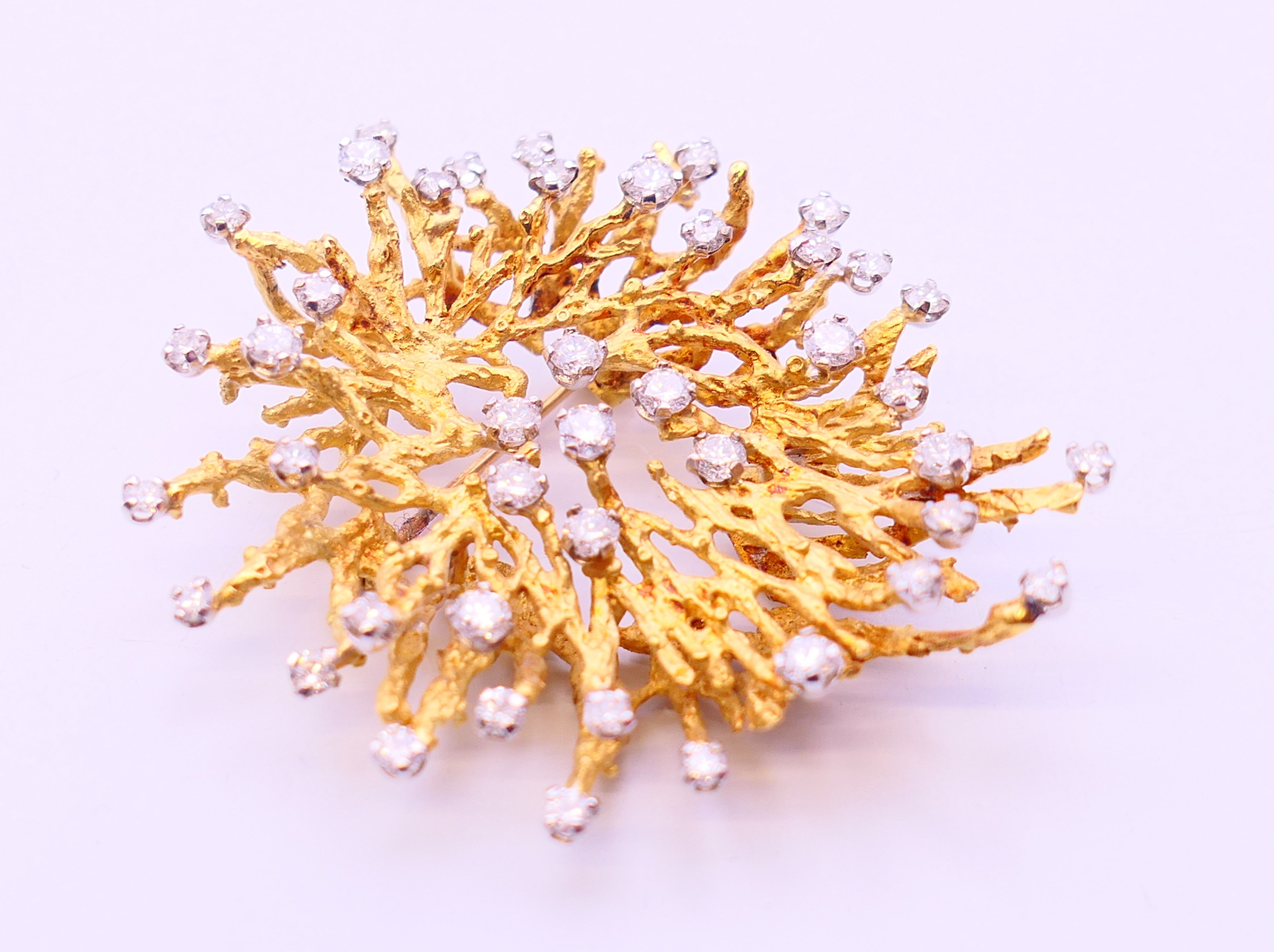 A 1970s unmarked (possibly 18ct) gold diamond abstract pendant/brooch, - Image 2 of 5