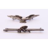 Two silver brooches, one formed as an eagle, the other a bar brooch with a pixie. Pixie brooch 5.