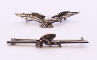 Two silver brooches, one formed as an eagle, the other a bar brooch with a pixie. Pixie brooch 5.
