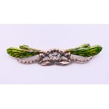 A silver double dragonfly brooch. 7 cm wide.