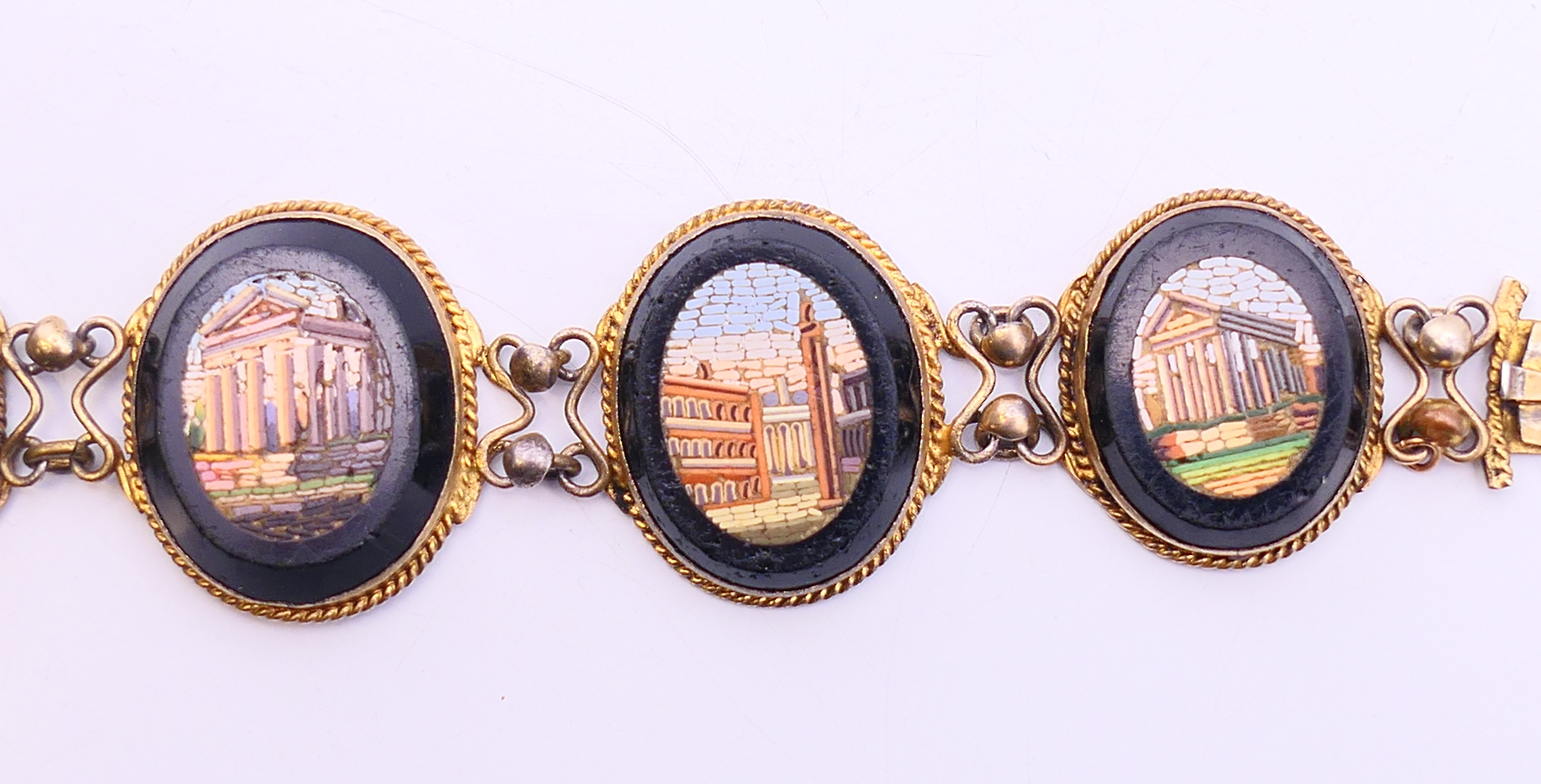 A 19th century micro-mosaic six panel brooch, the panels depicting Roman monuments. 18 cm long. - Bild 5 aus 8