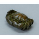 A bronze model of a crab. 7 cm wide.