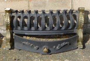A brass and iron fire front. 41 cm wide.