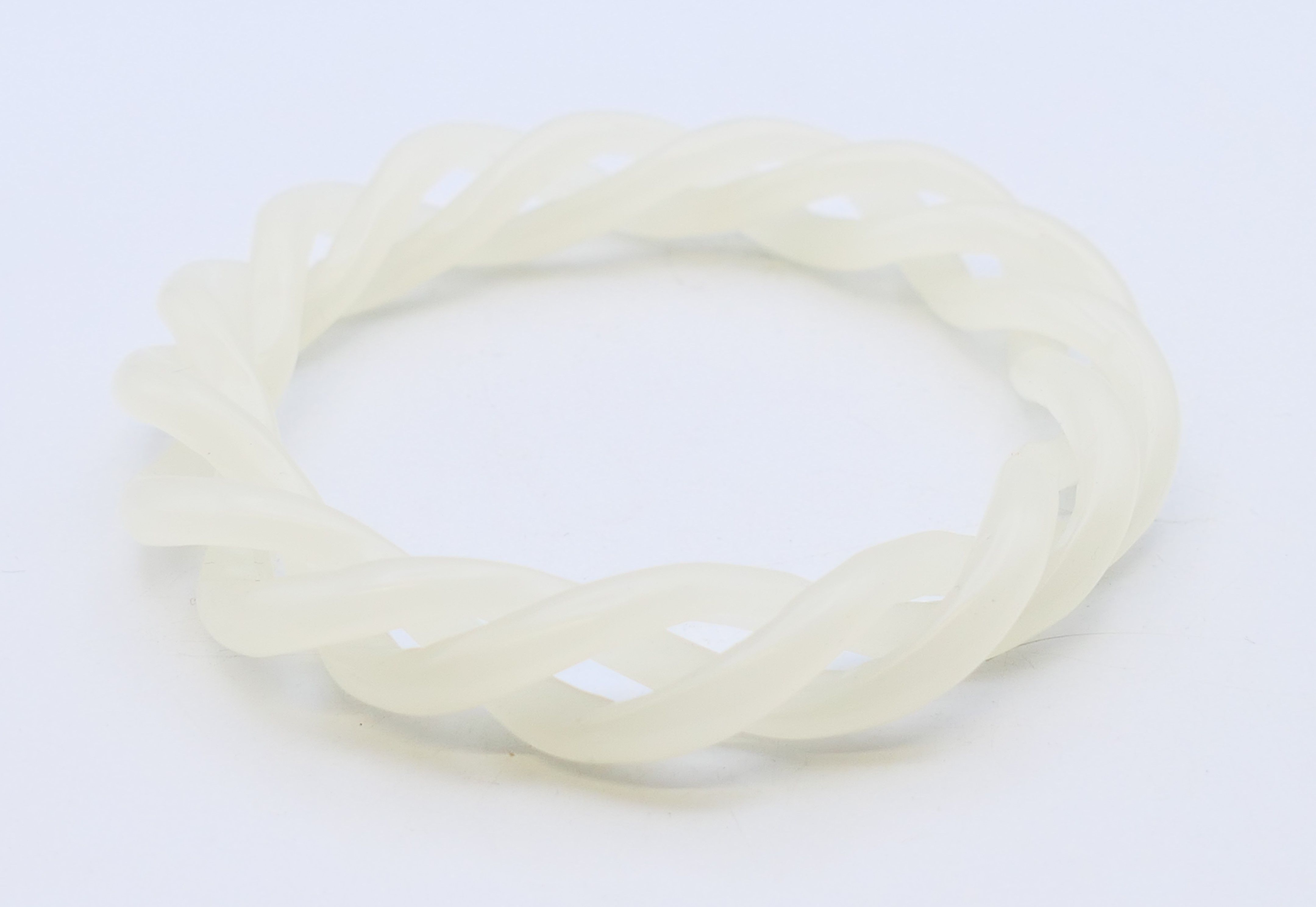 A white jade triple twist bangle. 6 cm internal diameter, 9 cm external diameter.