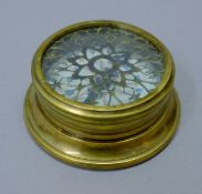 A brass compass. 7.5 cm diameter.