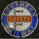 A railway enamel sign. 35 cm diameter.