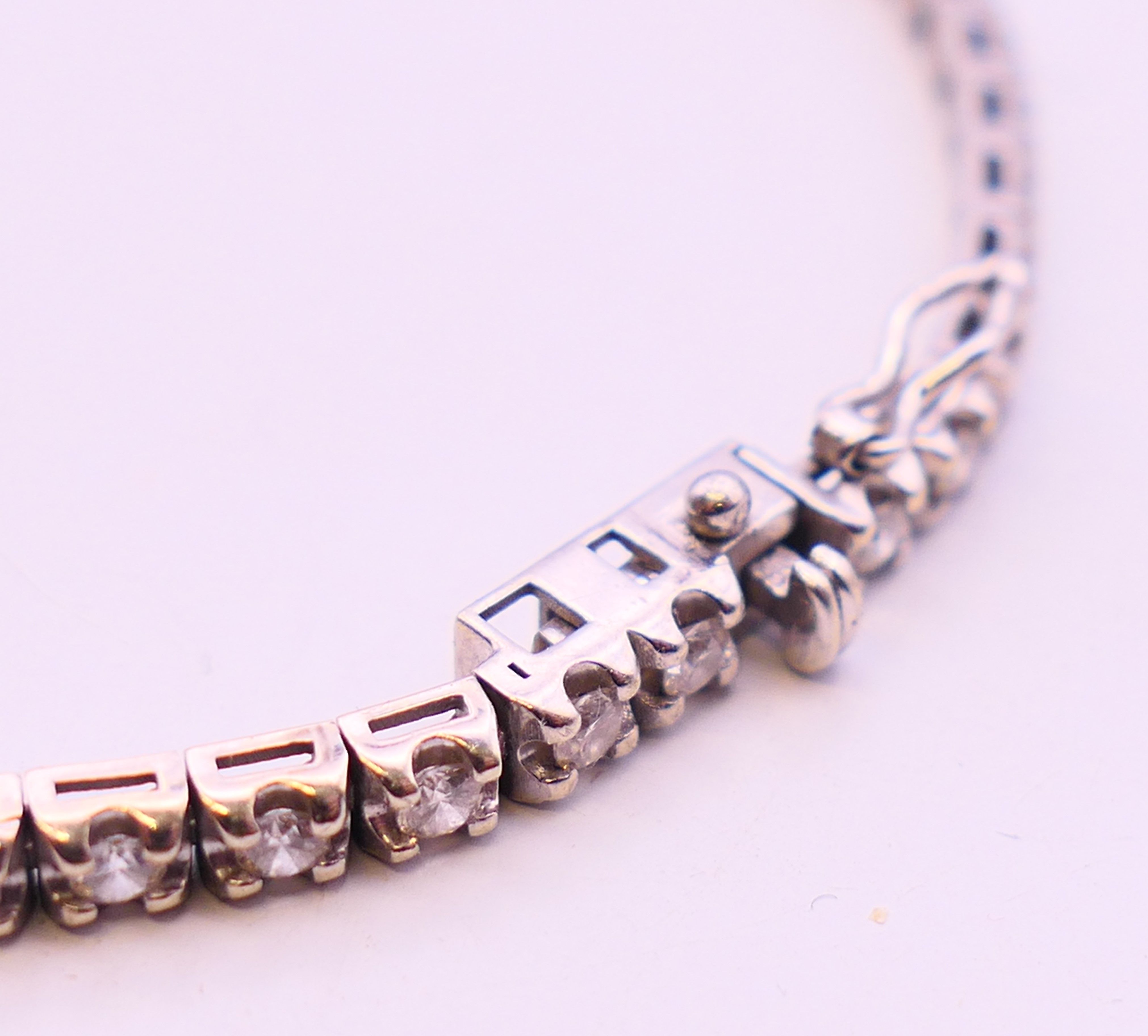 A white gold and diamond line bracelet. 18 cm long. - Image 3 of 4