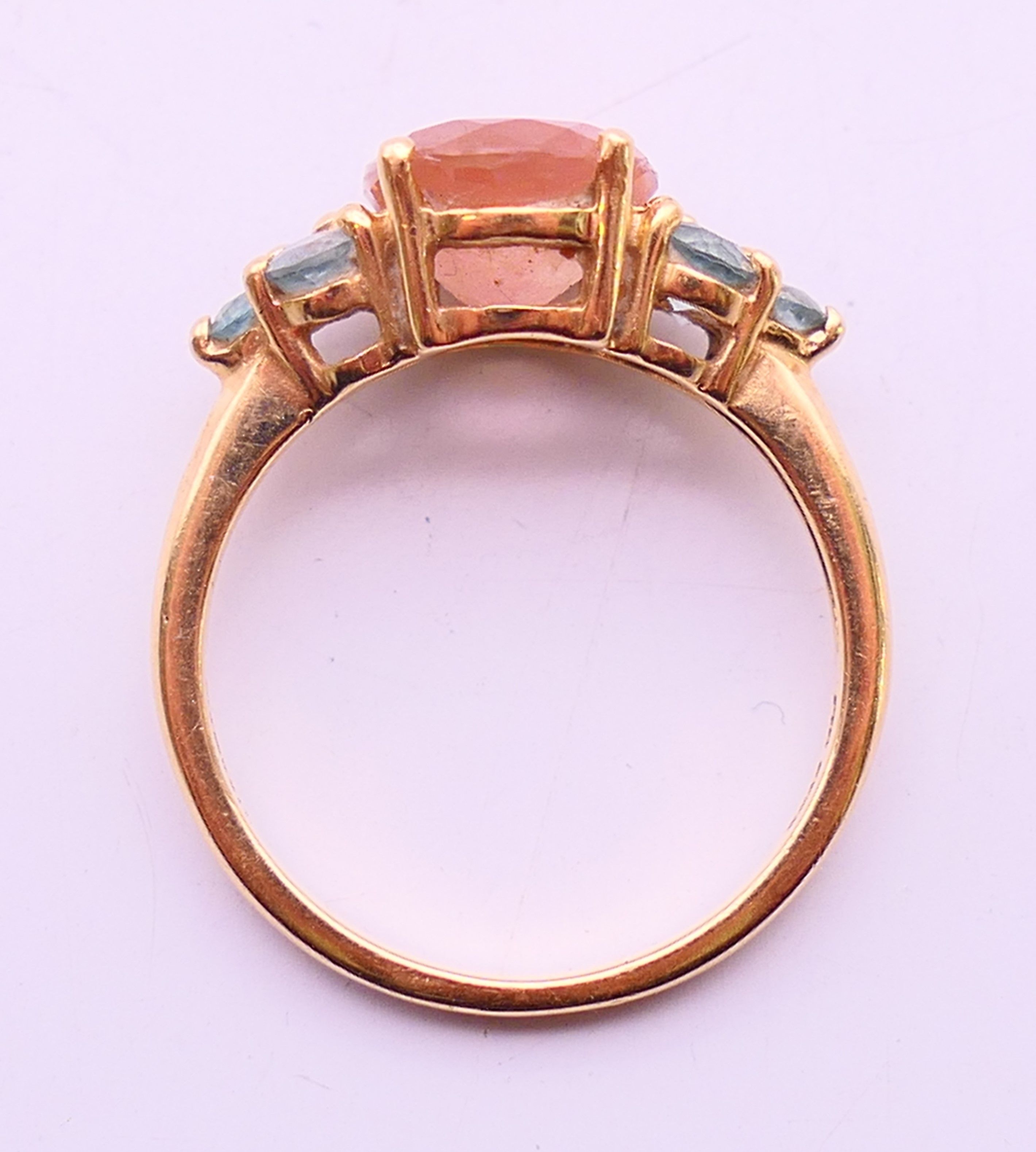 A 14 K topaz and tourmaline ring. Ring size N. - Image 8 of 8