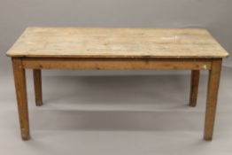 A Victorian pine kitchen table. 167 cm long x 75.5 cm wide.