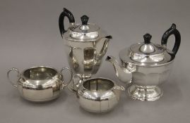A Viners silver-plated teapot, coffee pot, sugar bowl and cream jug. The coffee pot 18 cm high.