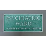 An cast iron psychiatric ward sign. 27 cm long.