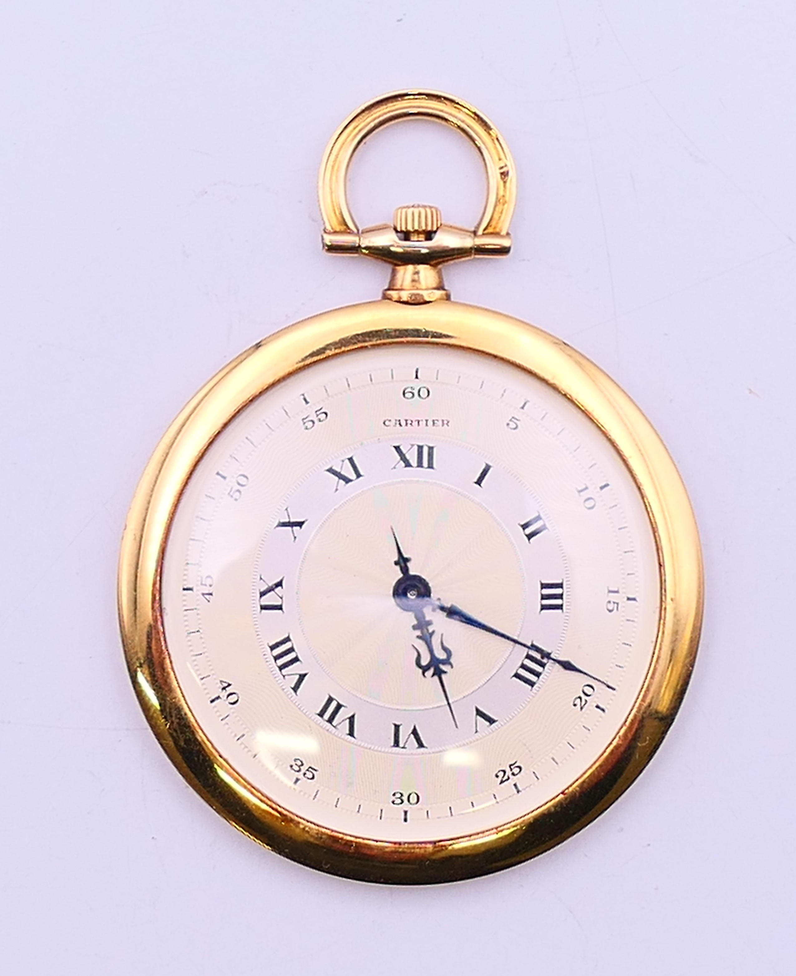 An 18 ct gold Cartier slimline open face pocket watch on black enamel 14 ct gold chain together
