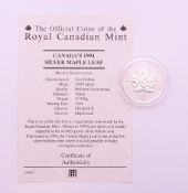 A 1994 Canada silver maple leaf 5 dollar coin, with certificate of authenticity.