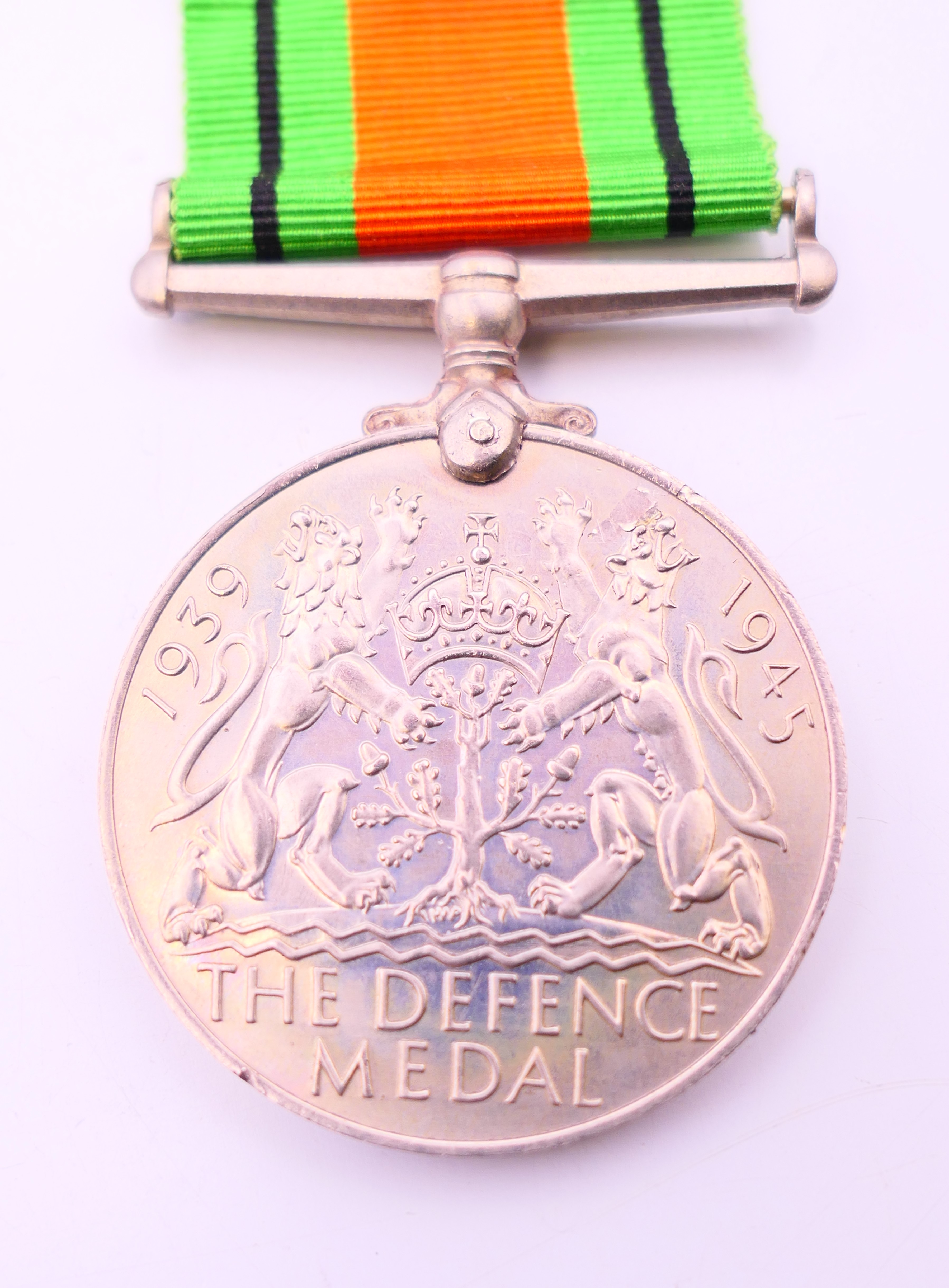 A WWII 1939-45 Defence medal. 3.75 cm diameter. - Image 2 of 3