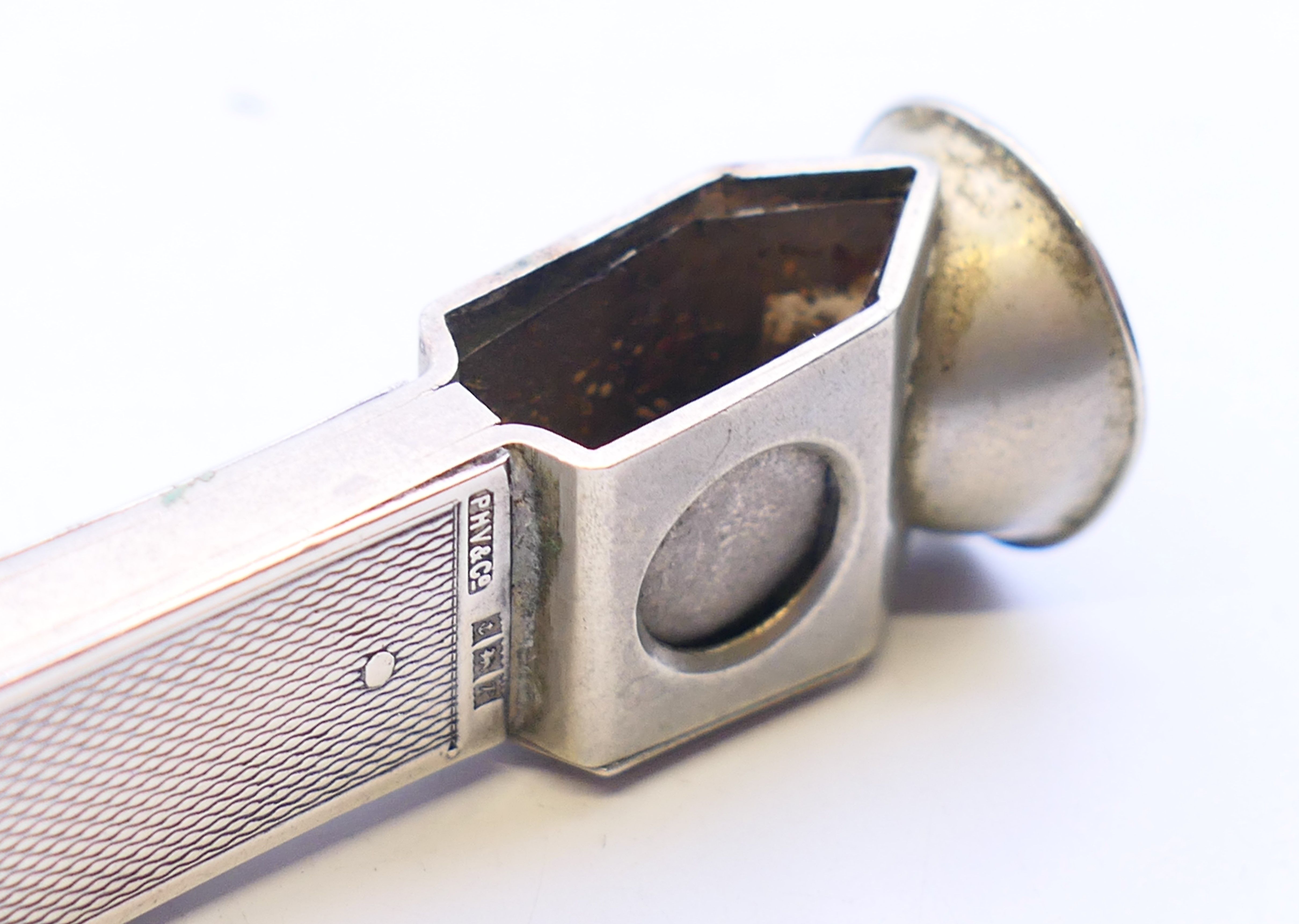 A silver cigar cutter. 7 cm high. - Image 5 of 6