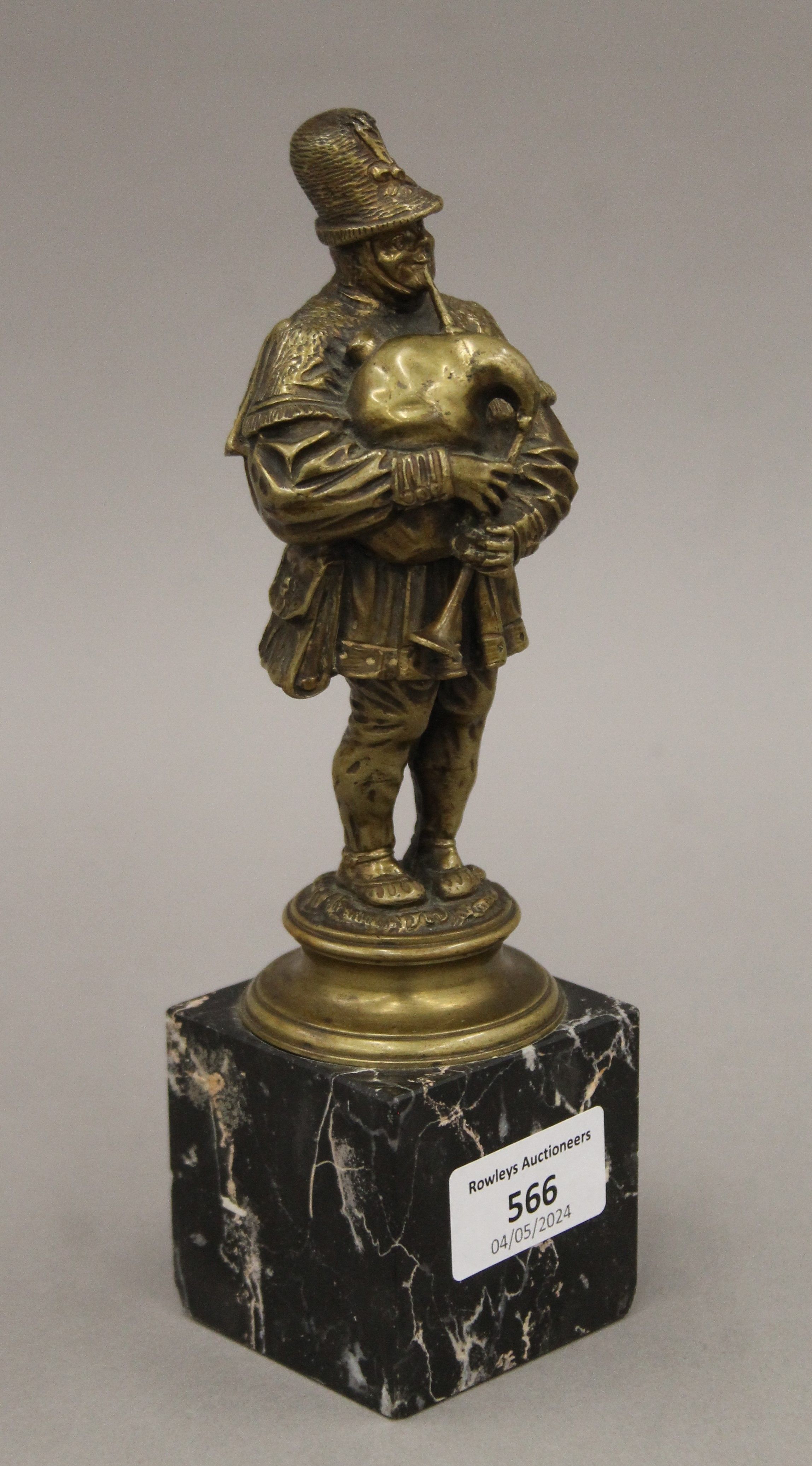 A 19th century gilt bronze figure of a bagpiper on a marble base. 21.5 cm high overall. - Image 3 of 6