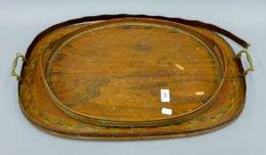 A 19th century painted tray and another. The former 65 cm long.