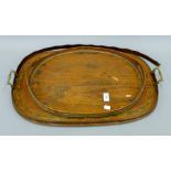 A 19th century painted tray and another. The former 65 cm long.