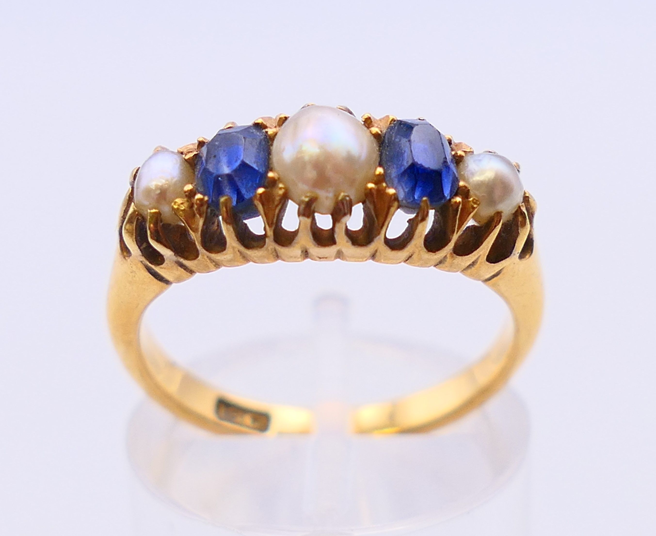 An 18 ct gold, seed pearl and sapphire ring. Ring size N. - Image 2 of 7