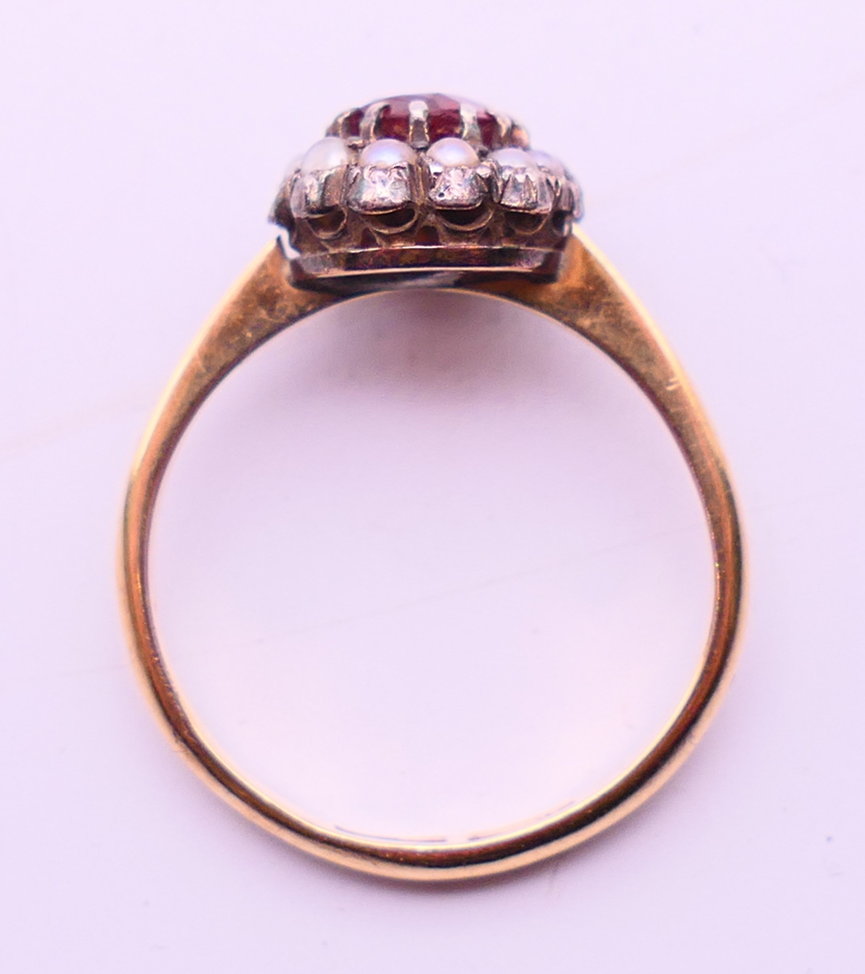 A 9 ct gold, seed pearl and garnet ring. Ring size O/P. - Image 7 of 7