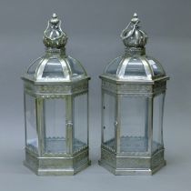 A pair of lanterns. 62 cm high.
