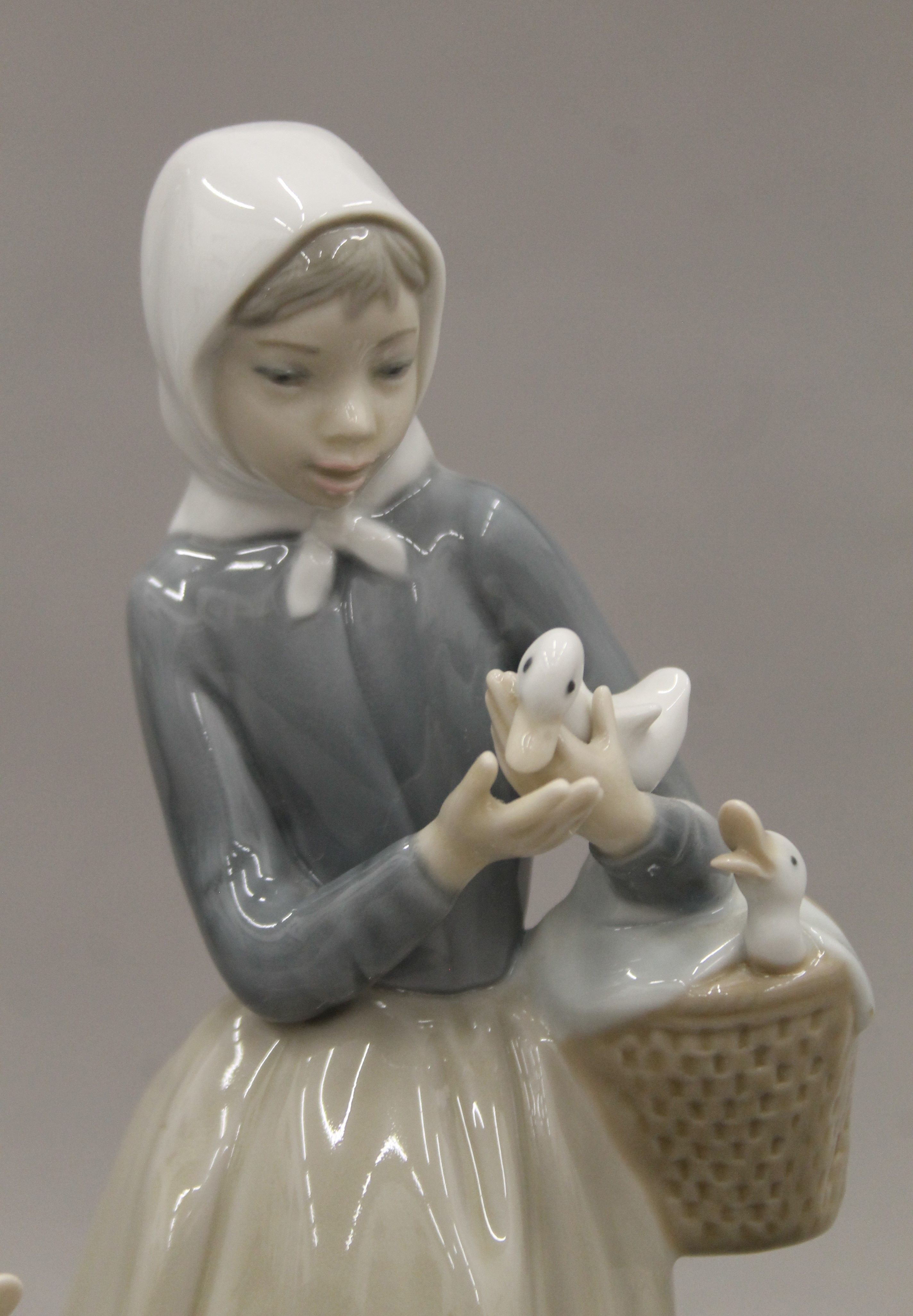 Four Lladro figurines and two Nao figurines. The largest 27.5 cm high. - Image 16 of 17