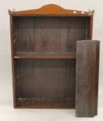 A mahogany open bookcase. 99 cm wide.