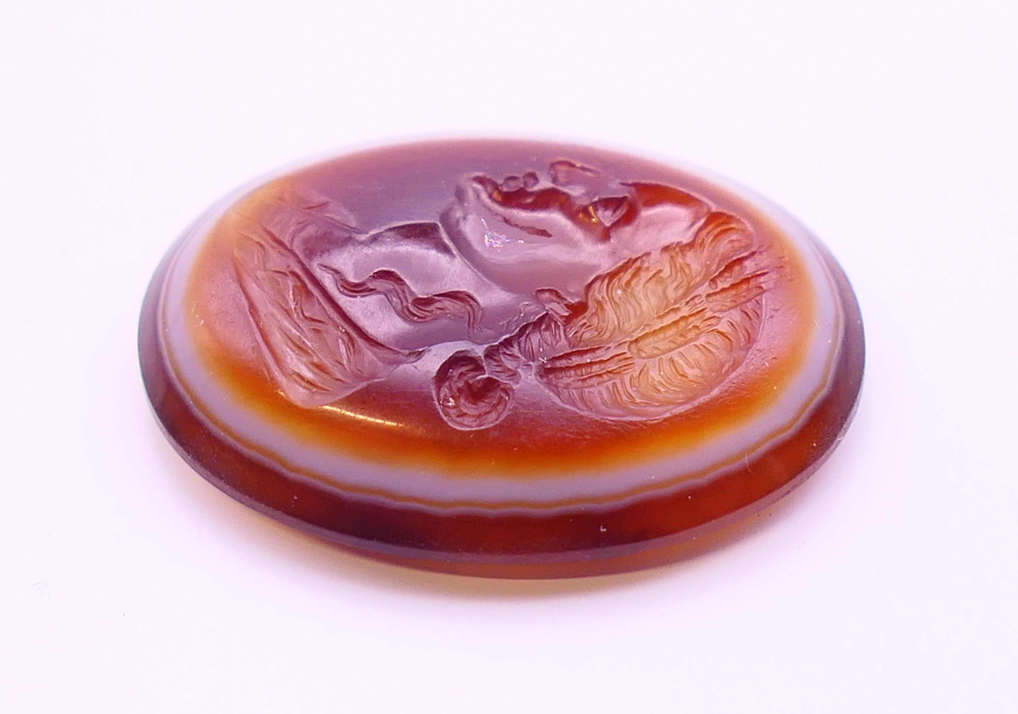 An antique banded agate intaglio carved with the profile of a Roman lady. 2. - Image 5 of 6