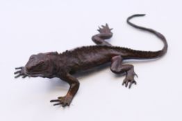 A bronze lizard. 15 cm long.
