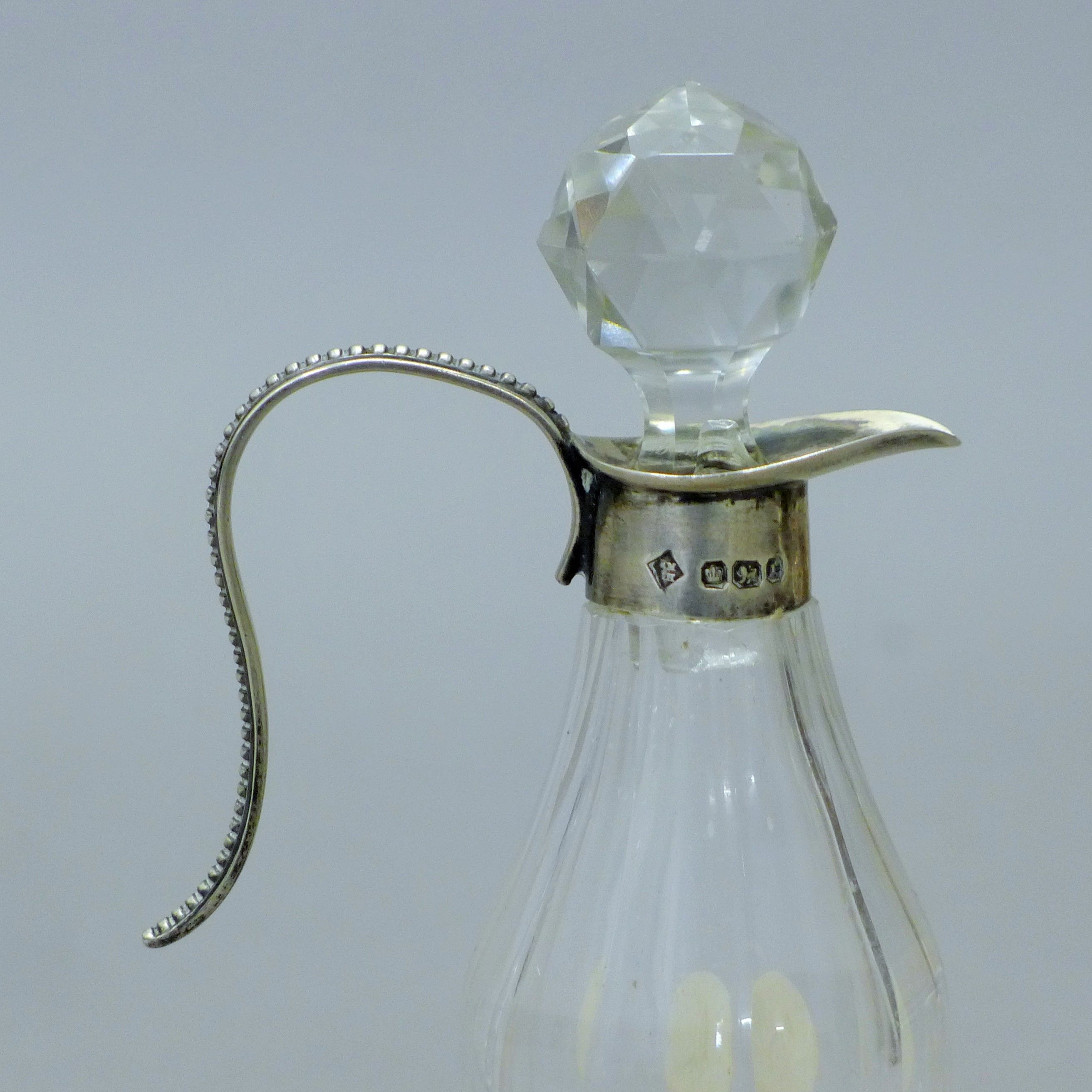 Two silver top cut glass oil and vinegar bottles, both with English silver marks. The tallest 14. - Image 6 of 7
