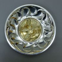 A silver and silver gilt limited edition Royal National Lifeboat Institution commemorative dish.