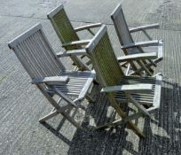 Four vintage folding wooden garden chairs. 57 cm wide.