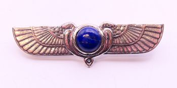 A silver and lapiz Egyptian revival brooch. 5 cm x 1.5 cm.