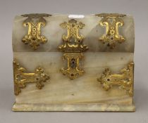 A Victorian brass mounted alabaster stationary box. 20 cm wide.