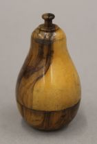 A treen cotton reel holder formed as a pear. 9 cm high.