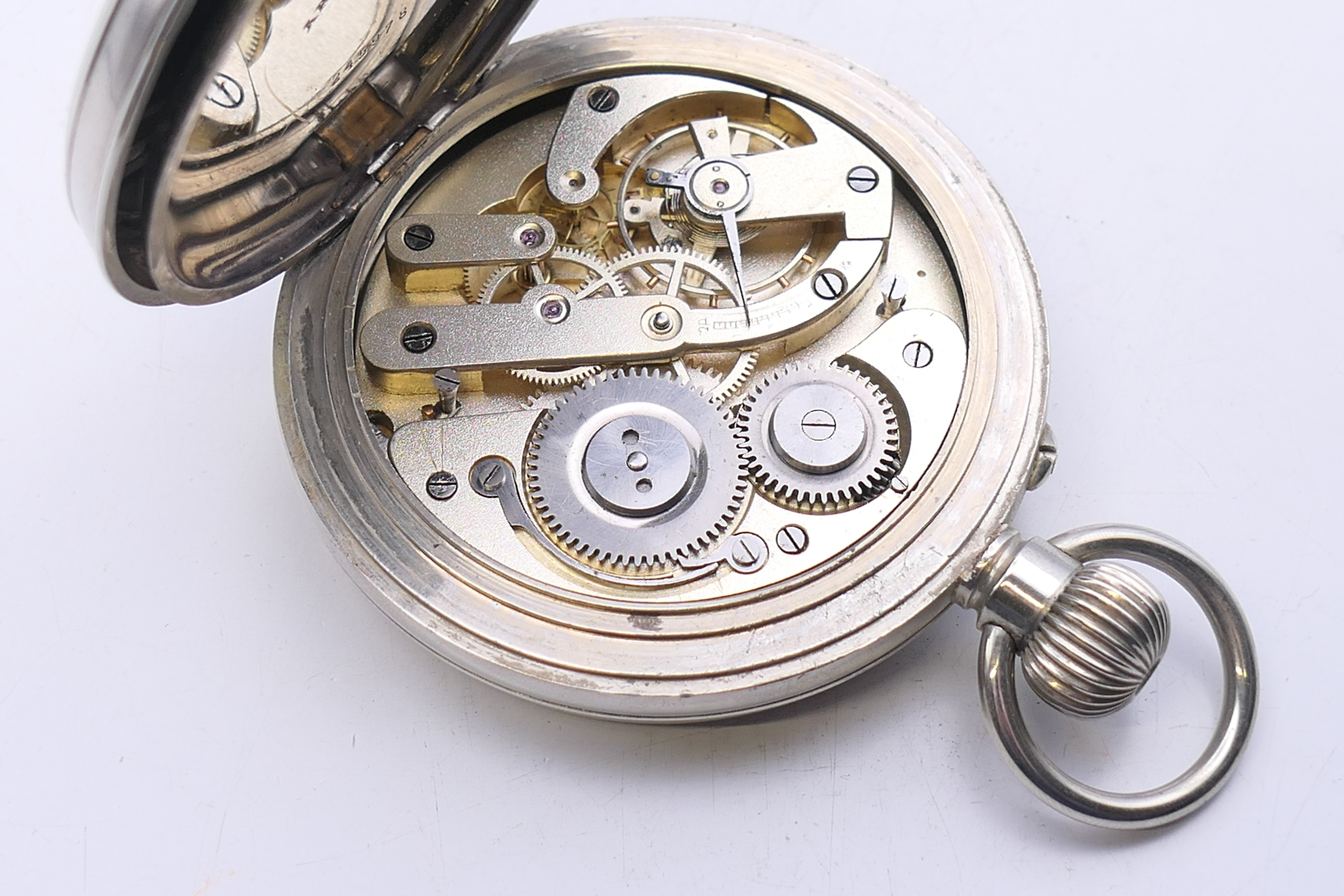 A Swiss silver plated Goliath pocket watch, housed in a silver-clad travelling case. - Image 7 of 9