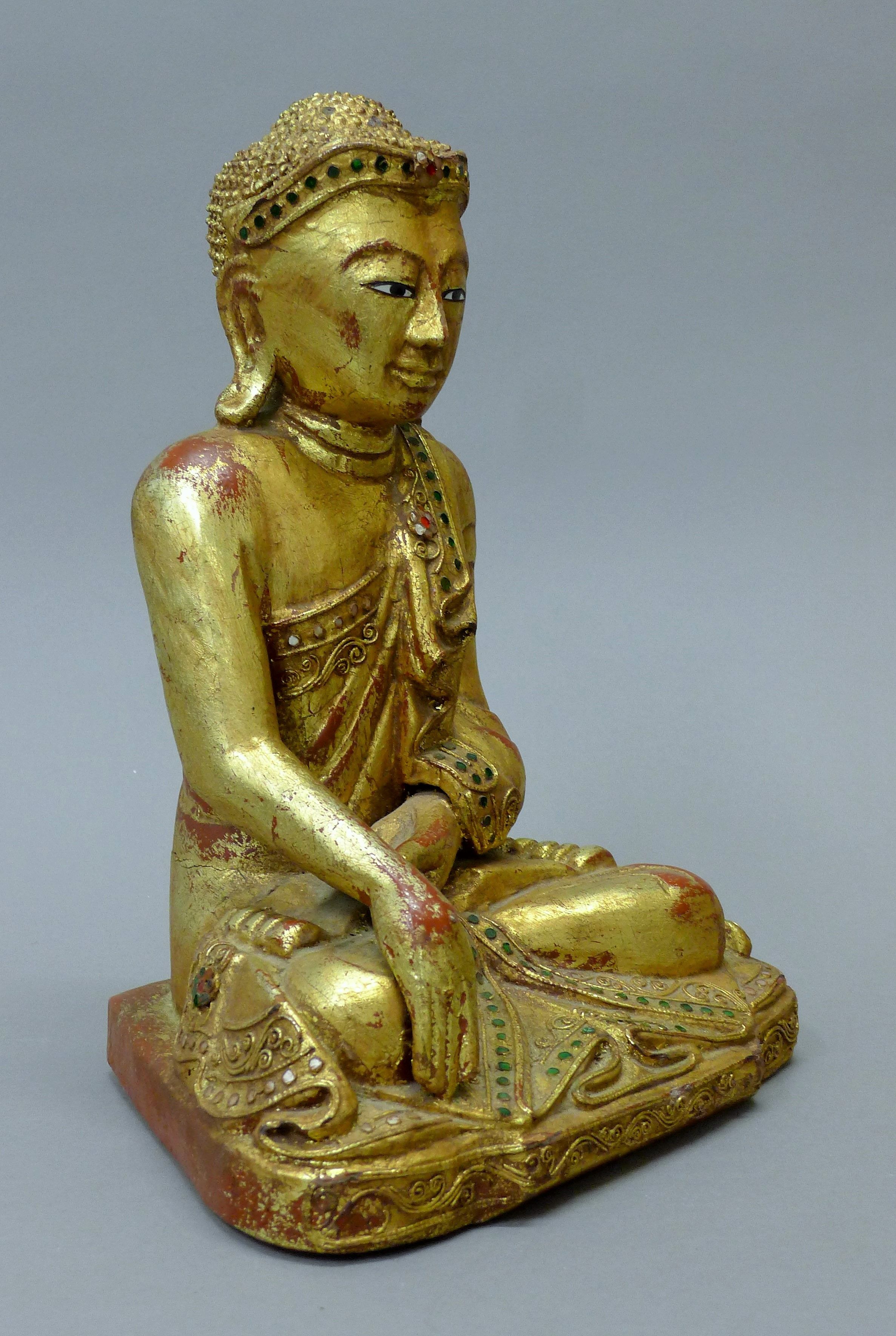 A gilt wood model of Buddha. 33 cm high. - Image 2 of 4