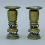 A pair of Japanese bronze vases. 19 cm high.