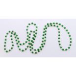 A string of pearl and jade beads. 120 cm long.