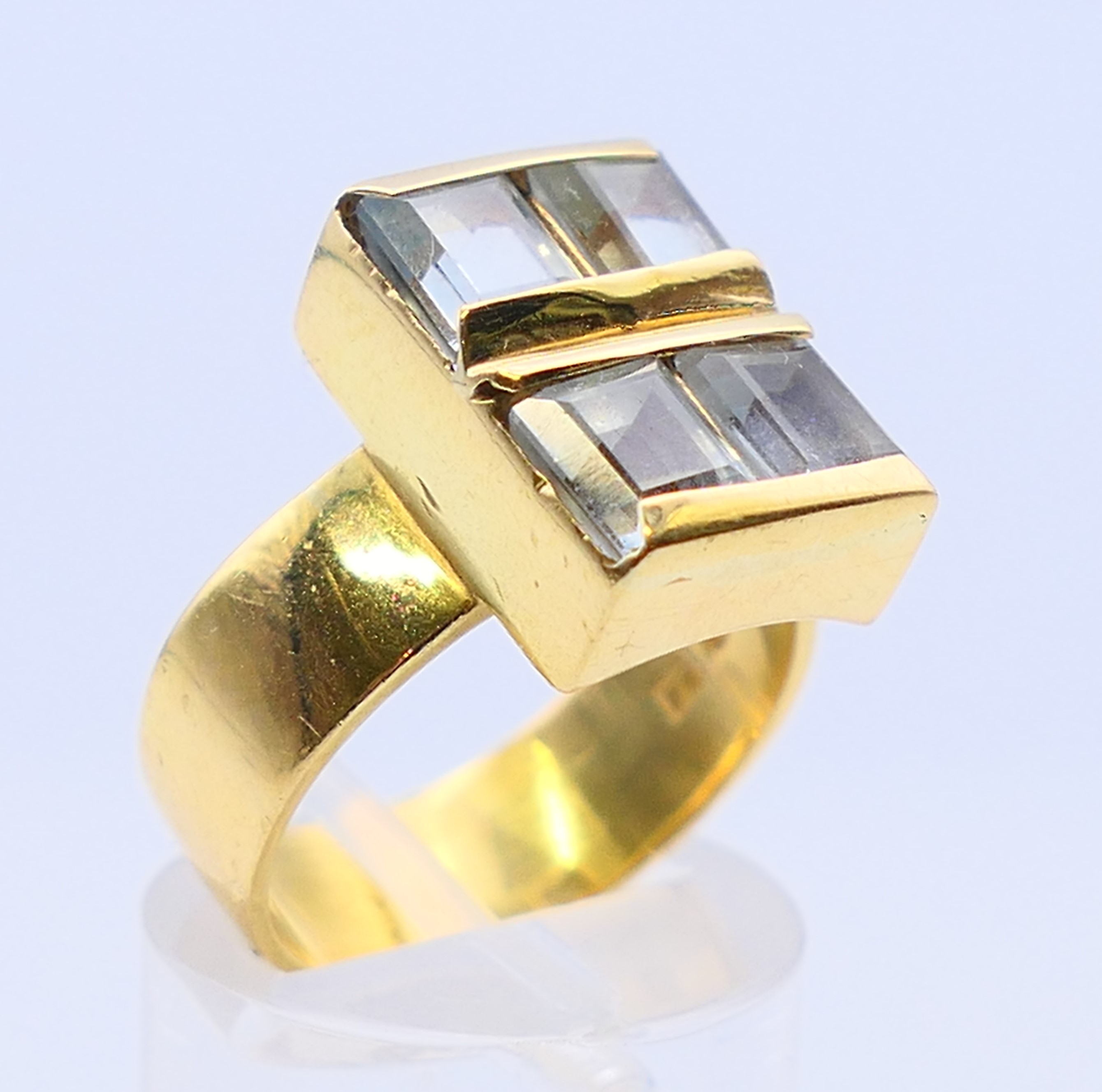 An 18 ct gold, aquamarine four stone ring, the emerald cut aquamarines 6 x 5mm x 3.9mm. Ring size O. - Image 3 of 7